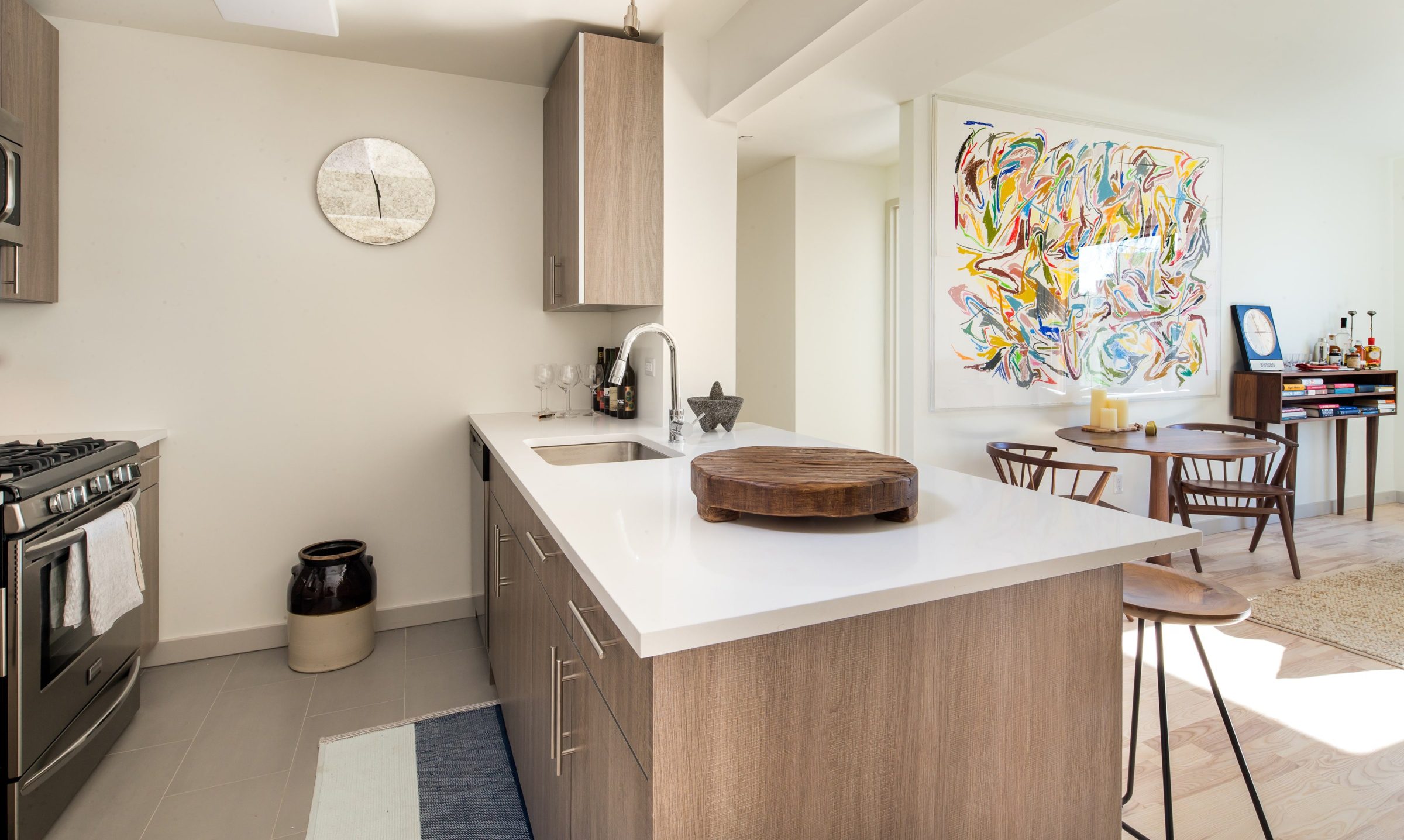 Kitchen with white counter tops and eru-style cabinets